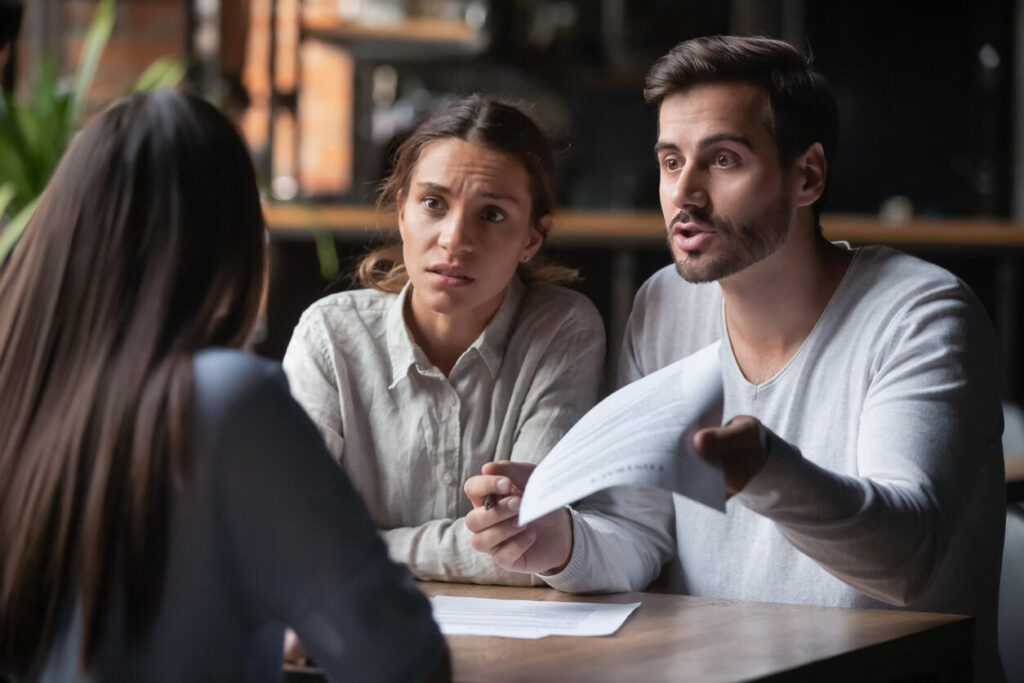 couple discussing bad Disability Insurance Denial